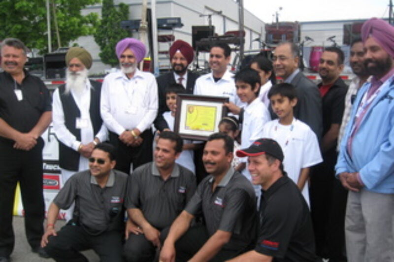 Dara Nagra receives the Entrepreneur of the Year award at the Road Today Truck Show.