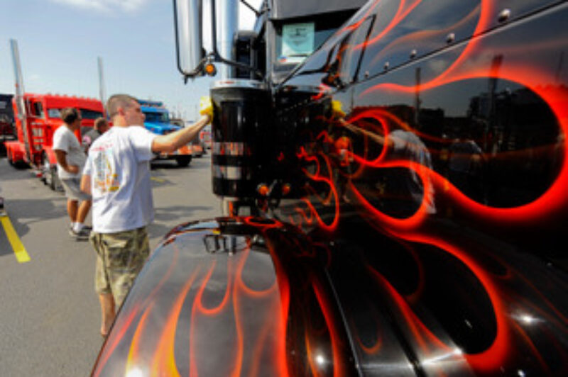 A driver polishes his rig at the Shell SuperRigs competition. (- Photo provided by Shell Lubricants)
