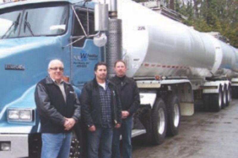 SAFETY FIRST: (L-R) Grant Allen, general manager; Tony Spring, vice-president; and Darrell Spring, president, have taken a safety-first approach to running Wheeler Transport.