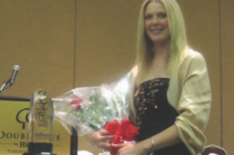 TOPS IN SHOP: Ben Vandespyker's daughter Lisa accepts the Maintenance Manager of the Year trophy on his behalf at CFMS.