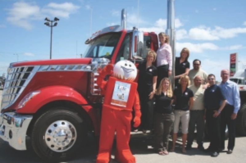 UP TO THE CHALLENGE: The Maxim Challenge for Life Team includes, top row (from left): Jan Shute, Meghan Furst, Maggie Makodanski and Will Dunbar. On the bottom row (from left): Challenge for Life mascot (Aaron Nienhuis), Janice Hazelton, Maili Wiechern, Mike Bodner, Mark Carlson and Doug Harvey. (Missing from the picture is Val Kolson).