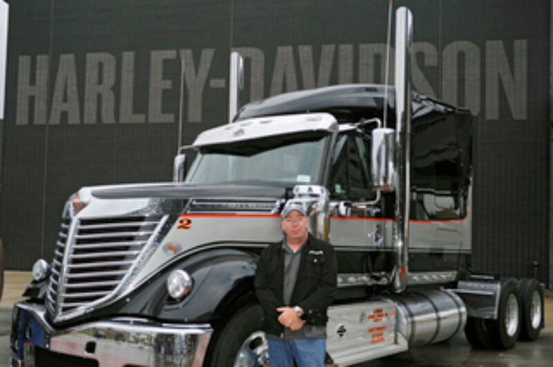 Chris Hawker poses in front of his Harley Davidson-inspired International LoneStar.
