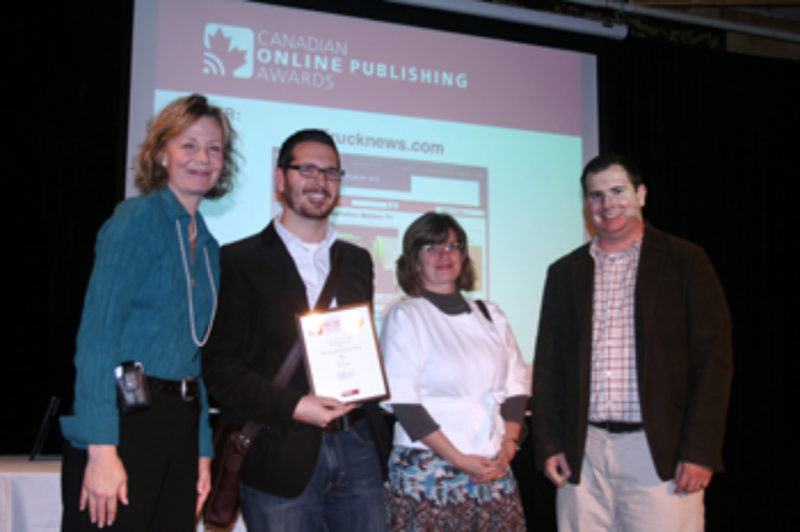Trucknews.com editors receive the Best Video prize at the Canadian Online Publishing Awards. Starting second from left: Adam Ledlow, Julia Kuzeljevich, and James Menzies.