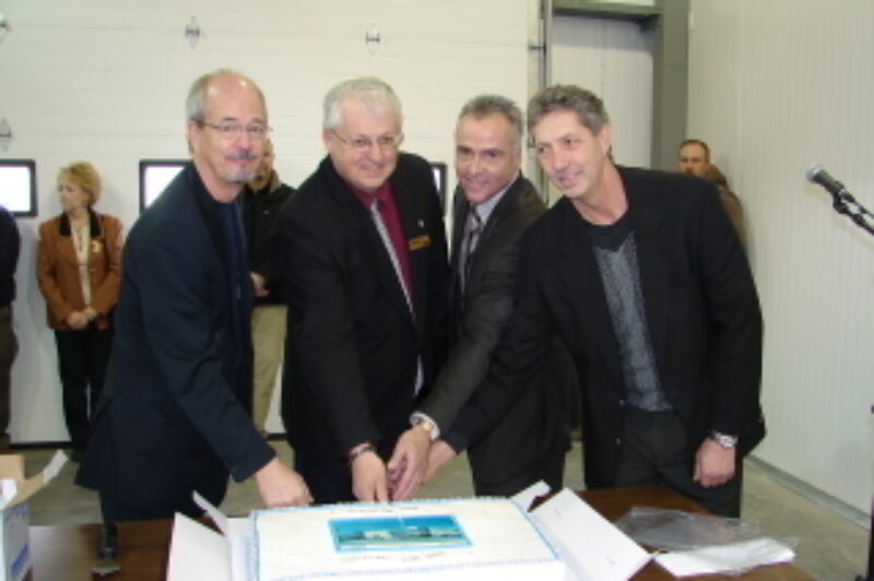 On-hand to cut the cake were: Roger Clarke, executive director, Vehicle Safety and Carrier Services, Alberta Transportation; Richard Warnock, president AMTA; Robert Feagan, director Partners in Injury Reduction, Alberta Employment and Immigration; and Ken Vertz, senior underwriting analyst, WCB.