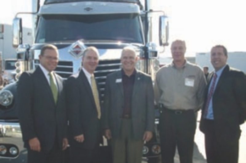 GRAND OPENING: Pictured from left to right: John Bowen, new truck sales manager; Michael Hummel, dealer development manager; Grant Ward, deputy mayor, Township of Langley; Rob Owen, general manager, Harbour International; and John Whitnell, vice-president, dealer operations.
