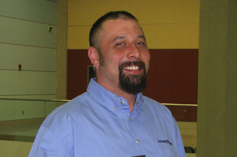 Junichi Shimizu poses with his award plaque shortly after winning the Goodyear North America Highway Hero title. Shimizu saved the lives of three people involved in a firey traffic accident in February 2009 to earn the award.