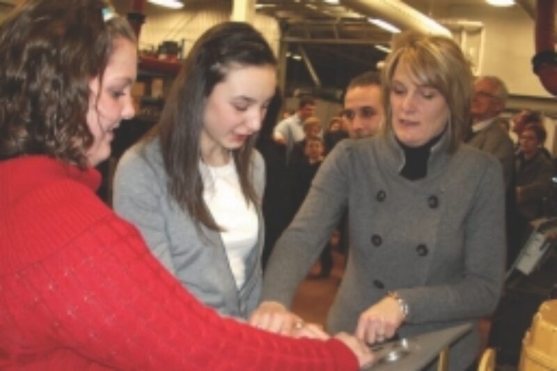 READY TO ROLL: Gerald Marshall's daughter Jo-Anne Spadafora (right) and family members start their engine to open the facility.