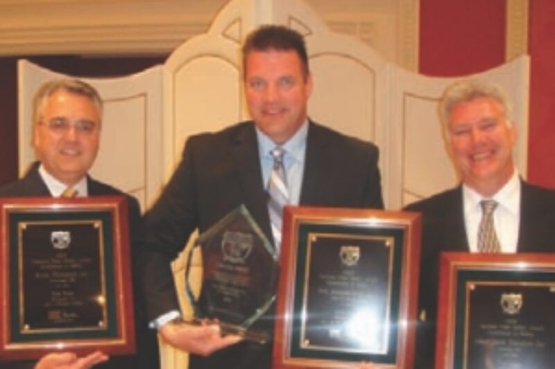 CANADIAN TRIO: Safety reps (l-r): Garth Pitzel (Bison); Tom Boehler (Erb); and Jeff Lehmann (MacKinnon) celebrate their hard-earned awards.
