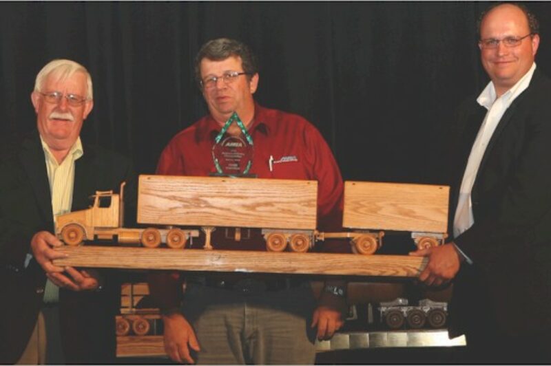 Paul Mills of Canada Safeway receives his award as Grand Champion.