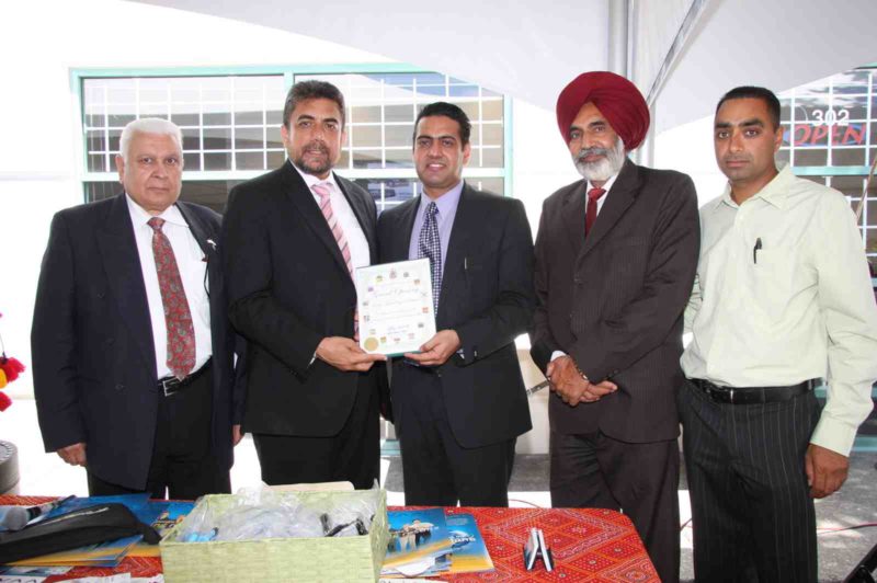 Avaal president and CEO Dara Nagra (centre) poses with special guests at the grand opening of the company's Surrey, B.C. office July 24.
