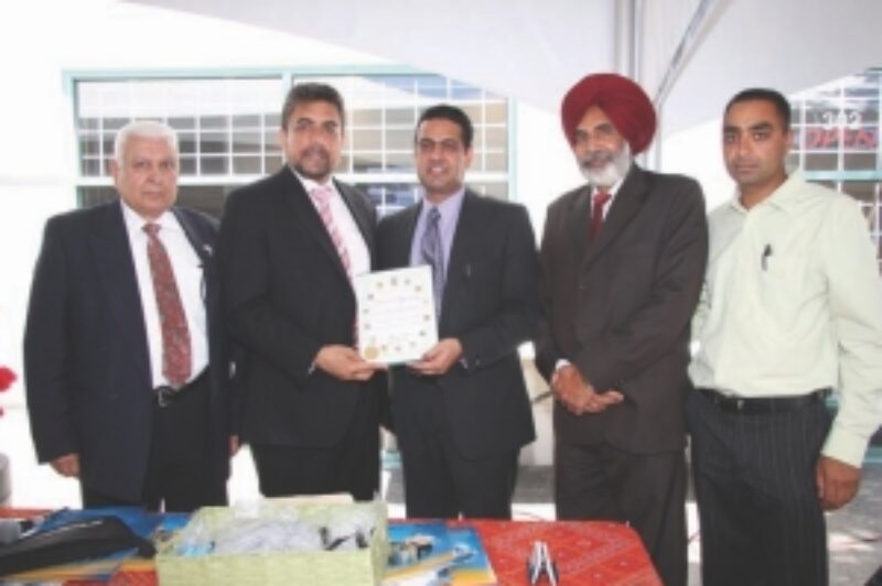 Expanding west: Avaal president and CEO Dara Nagra (centre) poses with special guests at the grand opening of the company's Surrey, B.C. office July 24. The new location is at 302-17665 66A Avenue in Surrey.