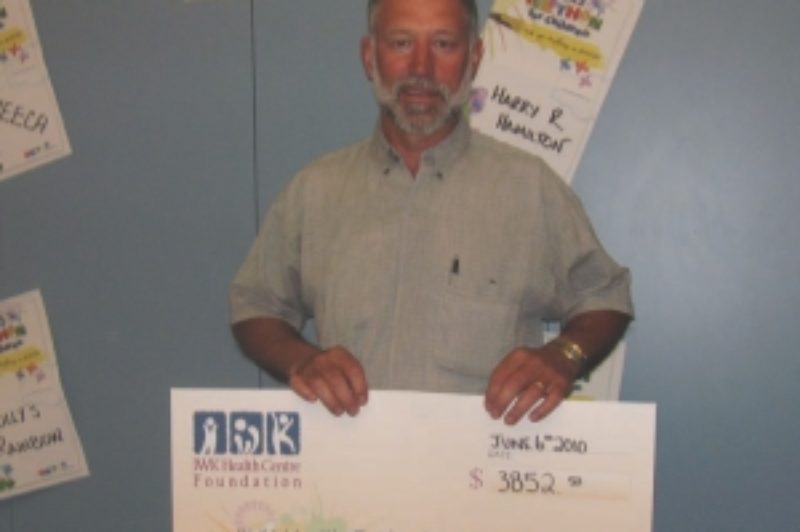 GIVING BACK: The Truckers Association of Nova Scotia (TANS) continued its tradition of giving back to charities. Here, vice-chair Gerry Van Dyk, presented the Halifax IWK Hospital with a cheque for $3,852.