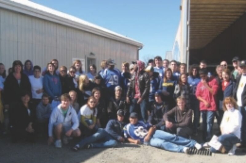 GROUP EFFORT: After collecting a record haul for the Caledonia Food Bank, volunteers posed for a group shot.