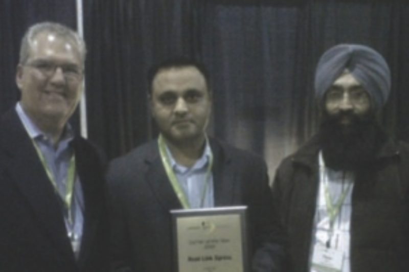 BEST OF THE BEST: Road Link Xpress won Carrier of the Year. Accepting the award from Lakeside's Jeff Moore was Raj Dhaliwal (middle) and Peter Sandhu.