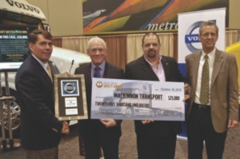 SAFETY PAYS: MacKinnon Transport was named winner of the Volvo Trucks Fleet Safety Award. Pictured are (l-r): Ron Huibers, Volvo; Evan MacKinnon and Rick Miller, MacKinnon Transport and Tim Fulton, Michelin.