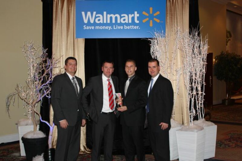 Bison Transport executives receive Innovative Carrier of the Year honours from Walmart Canada during a recent ceremony.