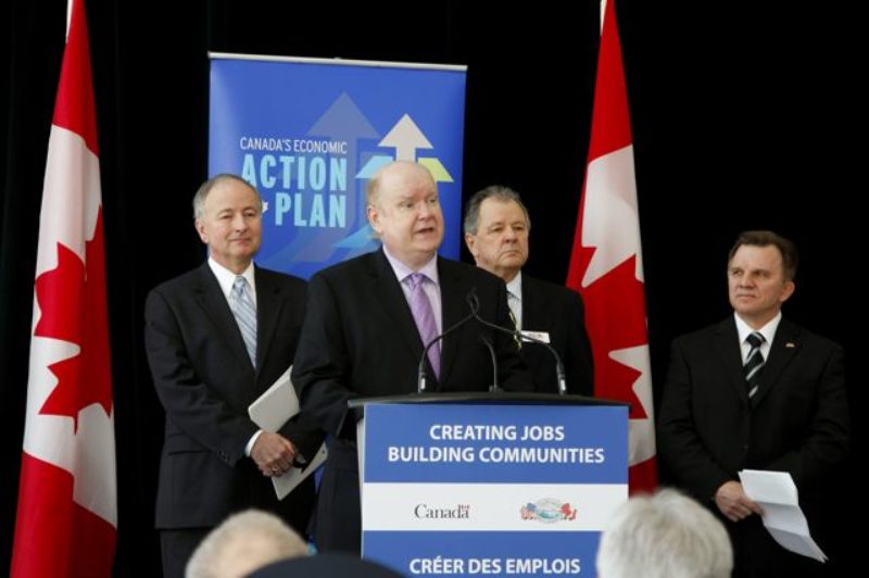 Pictured (L-R): Honourable Rob Nicholson, Tony Geoghegan, Dr. Kenneth Loucks, Lew Holloway.