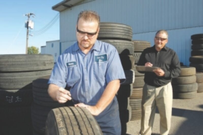 TEAMWORK: Ideally, scrap tire analysis is a two-person job. One person can read out observations while the other records the information.