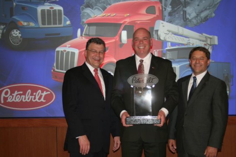 (L-R): Bill Jackson, Peterbilt general manager; Doug Danylchuk, Peterbilt Manitoba Ltd. dealer principal; Arlen Savitt, Peterbilt assistant general manager, sales & marketing.