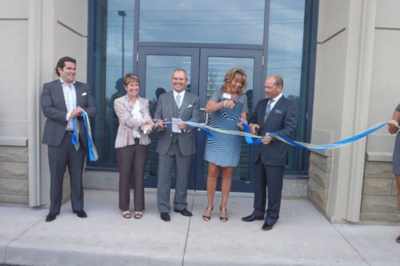 Pictured (From L-R): Jordan McCarter; Brenda Johnston, City Counsellor for area; George McCarter, president, Pearson Dunn Insurance; Bernie McCarter; Fred Losani, president, Losani Homes.