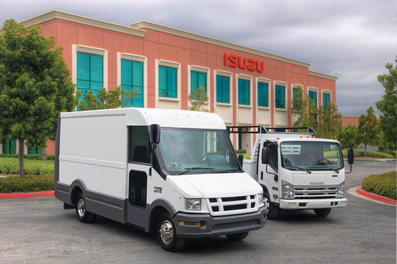 Production of Isuzu's NPR ECO-MAX (right), as well as the NPR-HD, NQR and NRR models, is now underway. The ECO-MAX joins Isuzu's Reach commercial van (left), as well as the NPR and NPR-HD gasoline-powered trucks, already in production.