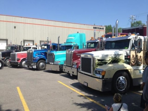 Trucks that took part in the convoy gathered in a NE Calgary parking lot, where drivers gathered to reflect on the loss of their friend Wes Brooks.