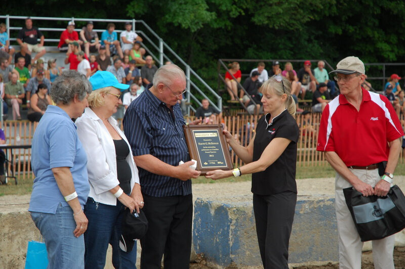 Harvey McDonald, 2012 O/O of the Year, receives a plaque from Brenda Grant of Truck News. To Harvey's right is wife Marg Oakley and OBAC's Joanne Ritchie. Mark Laine from sponsor Mack Trucks stands by. Representatives from sponsors Castrol and Goodyear were also on-hand for the presentation as well as officials from TransX.