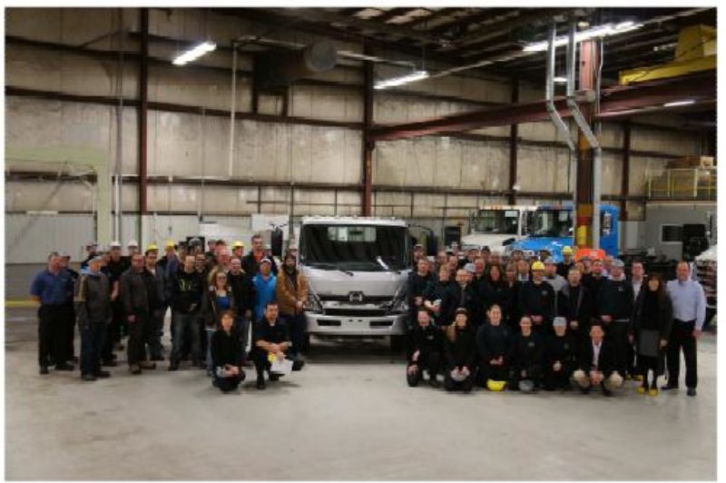 Hino reps, Mohawk College staff and students, and other dignitaries gather for Hino's donation of a new truck to the college Nov. 29.