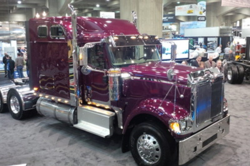 Show-goers admire the International 9900i at this year's ExpoCam in Montreal. Along with the PayStar 5900 SBA, the 9900i is one of two models International chose to 're-release' at the show.