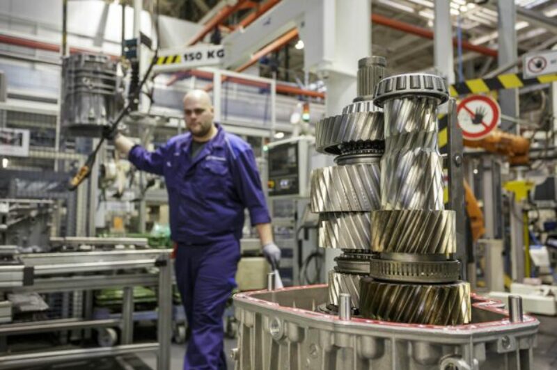 A Daimler plant employee helps manufacture a Detroit DT12 transmission at the company's Gaggenau, Germany facility.