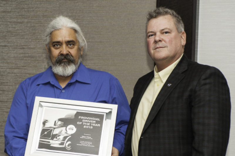 Manitoba's Driver of the Year Mark Tricco (left) was presented the honour, in part, for boasting two million accident-free miles in his career.