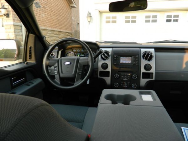 An interior shot of the F-150, including 'The Kitchen Table' console, providing a large work area.