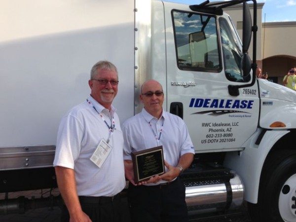 Roadranger representatives Jay Riley (left) and Rick Eckert accepted an award on behalf of Eaton, as the top supplier to Idealease.