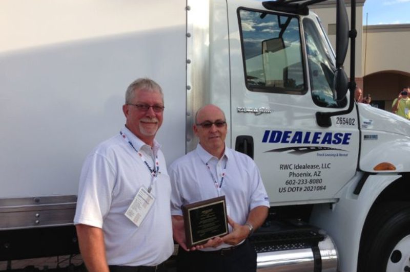 Roadranger representatives Jay Riley (left) and Rick Eckert accepted an award on behalf of Eaton, as the top supplier to Idealease.