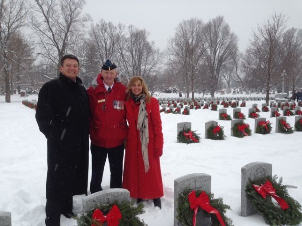 From left-to-right: Rob Penner, Craig McPhee and Kathy Penner lay wreaths at the Beechwood National Cemetery.