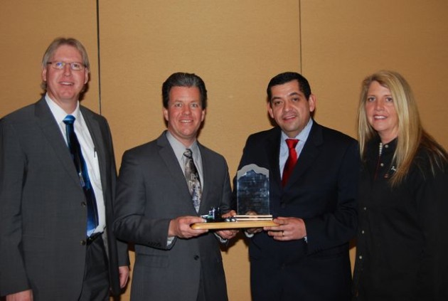 WABCO Reman Solutions was named the Heavy Duty Remanufacturer of the Year award winner by the Heavy Duty Remanufacturing Group (HDRG). Accepting the Award from Sandra Standley, right, chairman of HDRG, is a team from WABCO Reman Solutions, including (left to right) Joe Kripli, Global Business Development Leader; Jeffrey Stukenborg, Chief Engineer; and Salvador Munoz, Reman Business Leader.