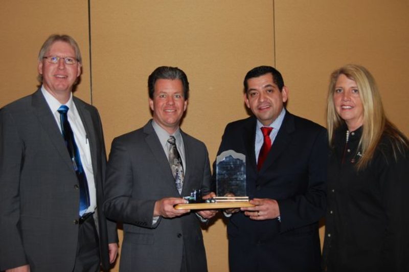 WABCO Reman Solutions was named the Heavy Duty Remanufacturer of the Year award winner by the Heavy Duty Remanufacturing Group (HDRG). Accepting the Award from Sandra Standley, right, chairman of HDRG, is a team from WABCO Reman Solutions, including (left to right) Joe Kripli, Global Business Development Leader; Jeffrey Stukenborg, Chief Engineer; and Salvador Munoz, Reman Business Leader.