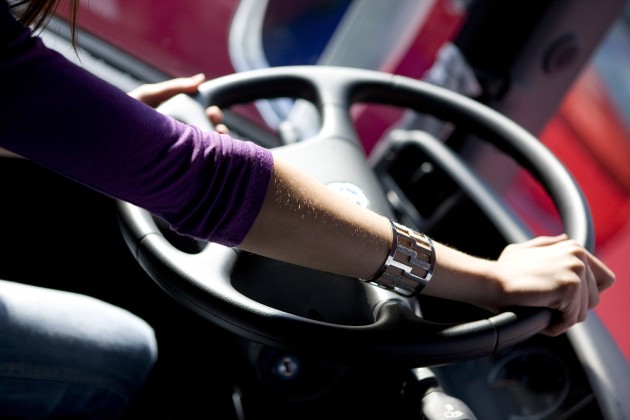 Woman at the wheel alternate text for this image