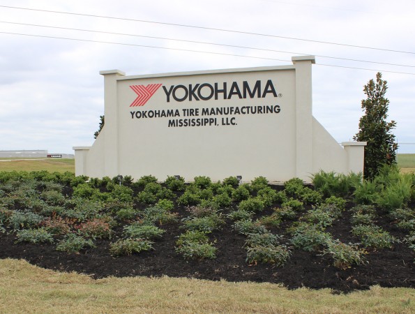 YTMM sign w plants alternate text for this image