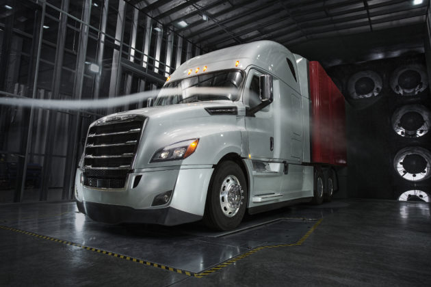 New Freightliner Cascadia 126 bbc 72 Raised Roof Sleeper Cab undergoing aerodynamic testing in DTNA’s proprietary wind tunnel alternate text for this image