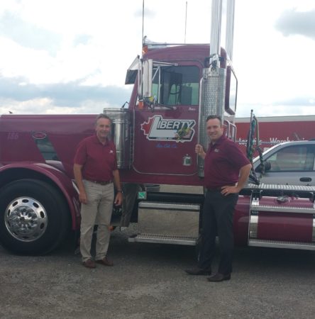 Caption – Brian Taylor (left) and Chris Gerber believe trusting in millennials to be the face for Liberty behind the wheel. alternate text for this image