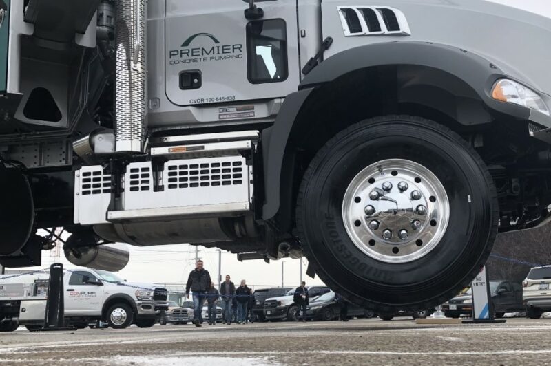 concrete pumper with outriggers deployed