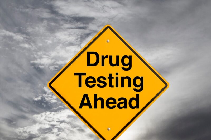 Drug testing highway sign