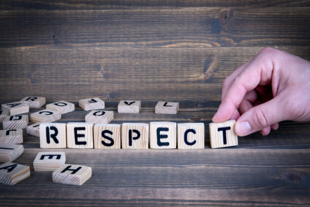 Respect. Wooden letters on the office desk alternate text for this image