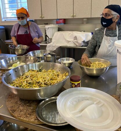 Volunteers pack meals