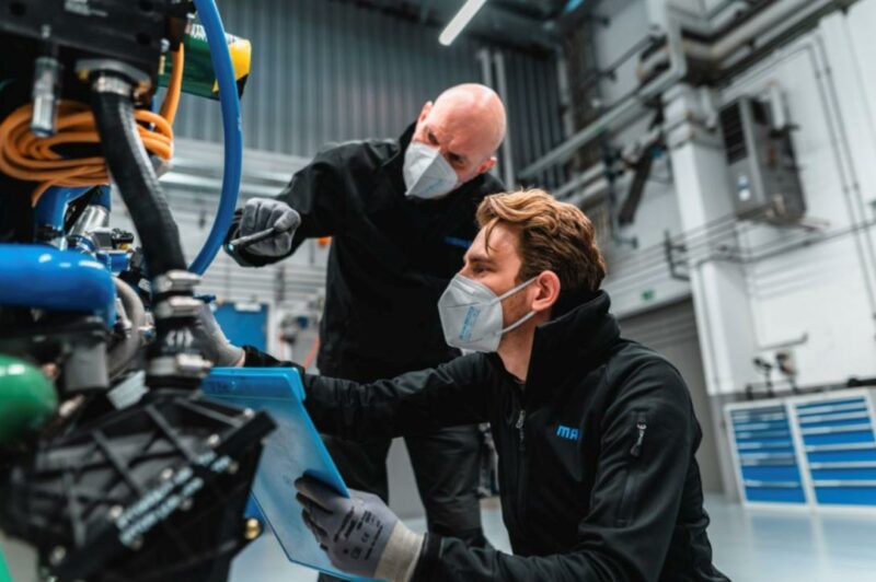 Mahle engineers working on Ballard fuel cell