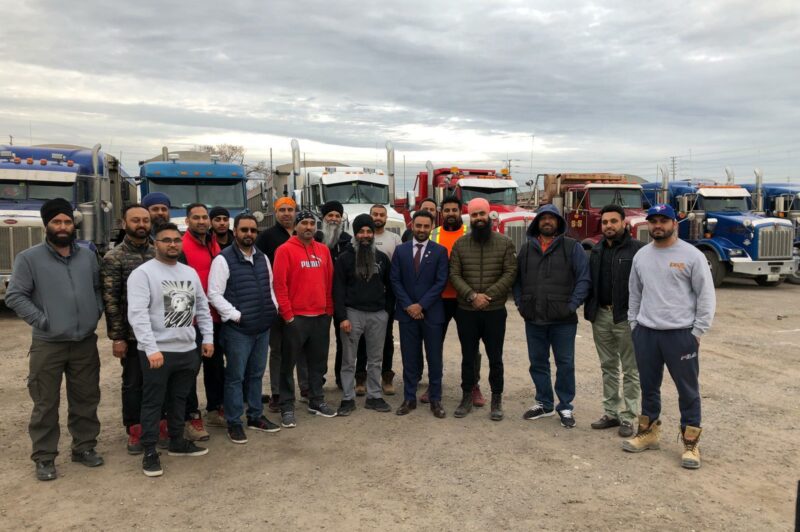 Dump trucks take to Toronto highways, protesting insurance costs article image
