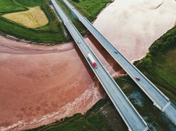 Semi Truck Crosses Tidal River alternate text for this image