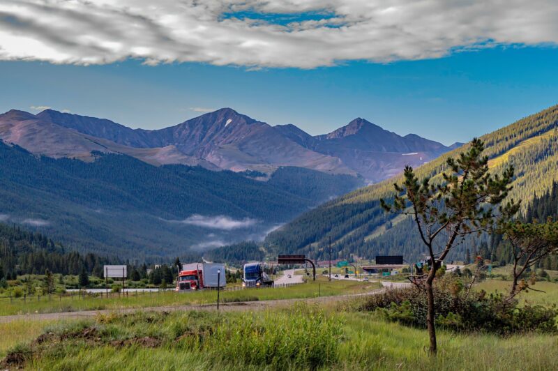 Trucks roll along the highway near Grand Junction, Colorado