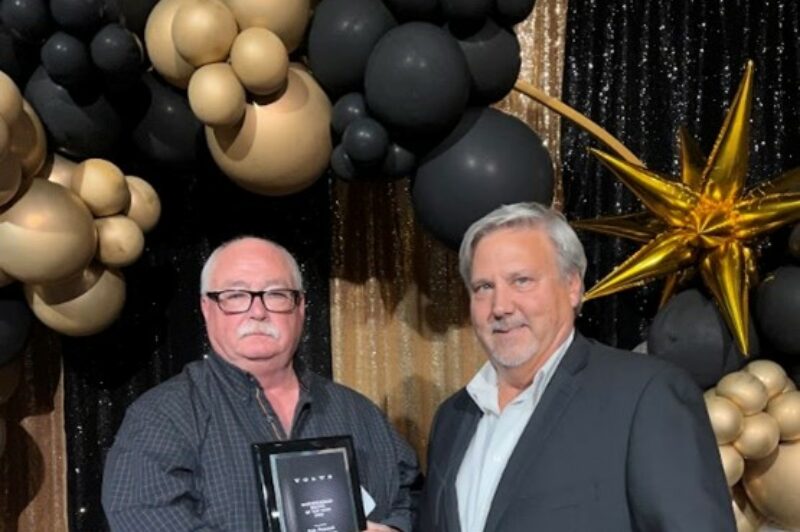 Picture of Dale Peacock on the left with another person